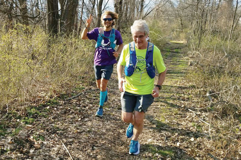 Ray Pinney and Anthony Certa running