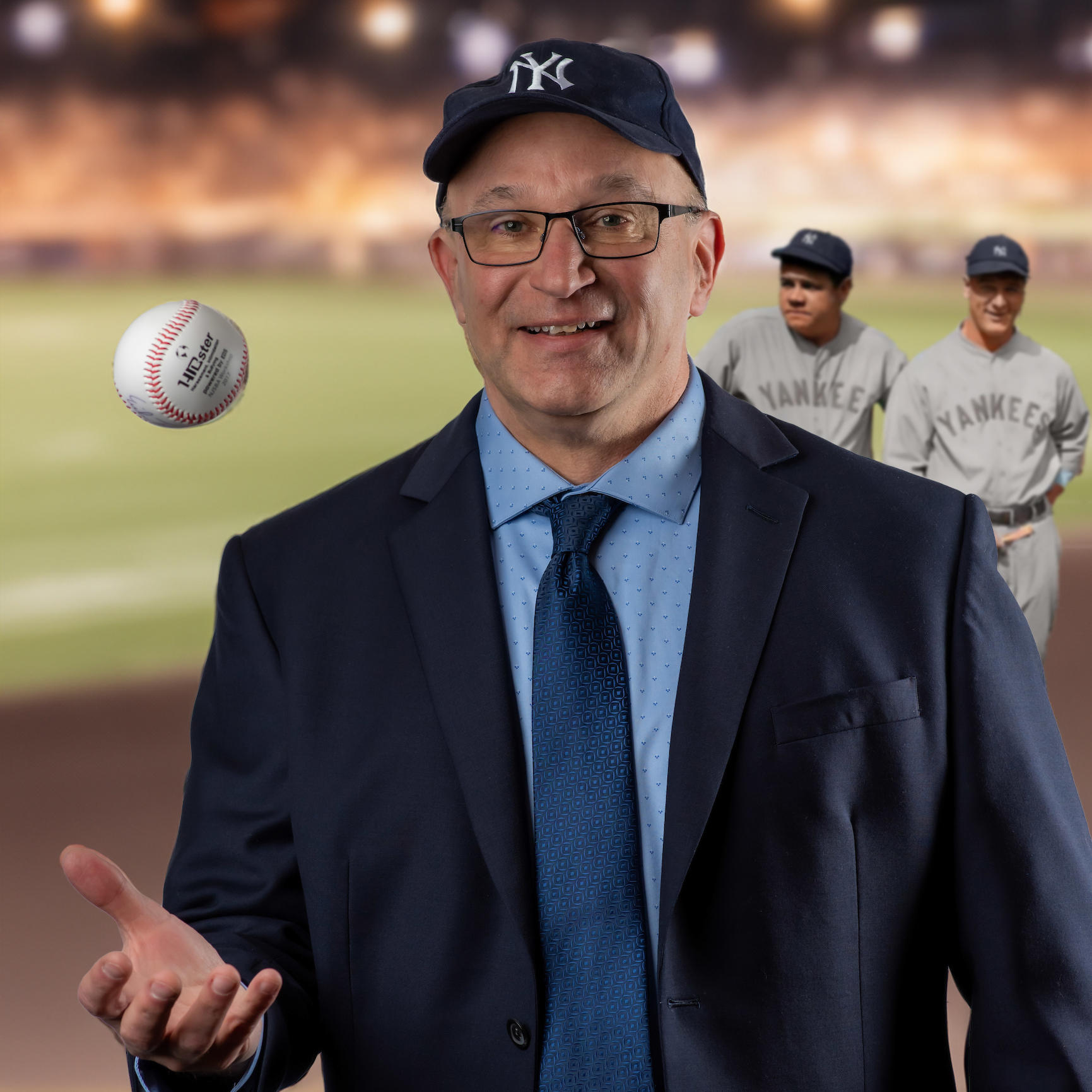 Matt Lee posining in a Yankees hat tossing a baseball with Babe Ruth in Yankee Stadium in the background