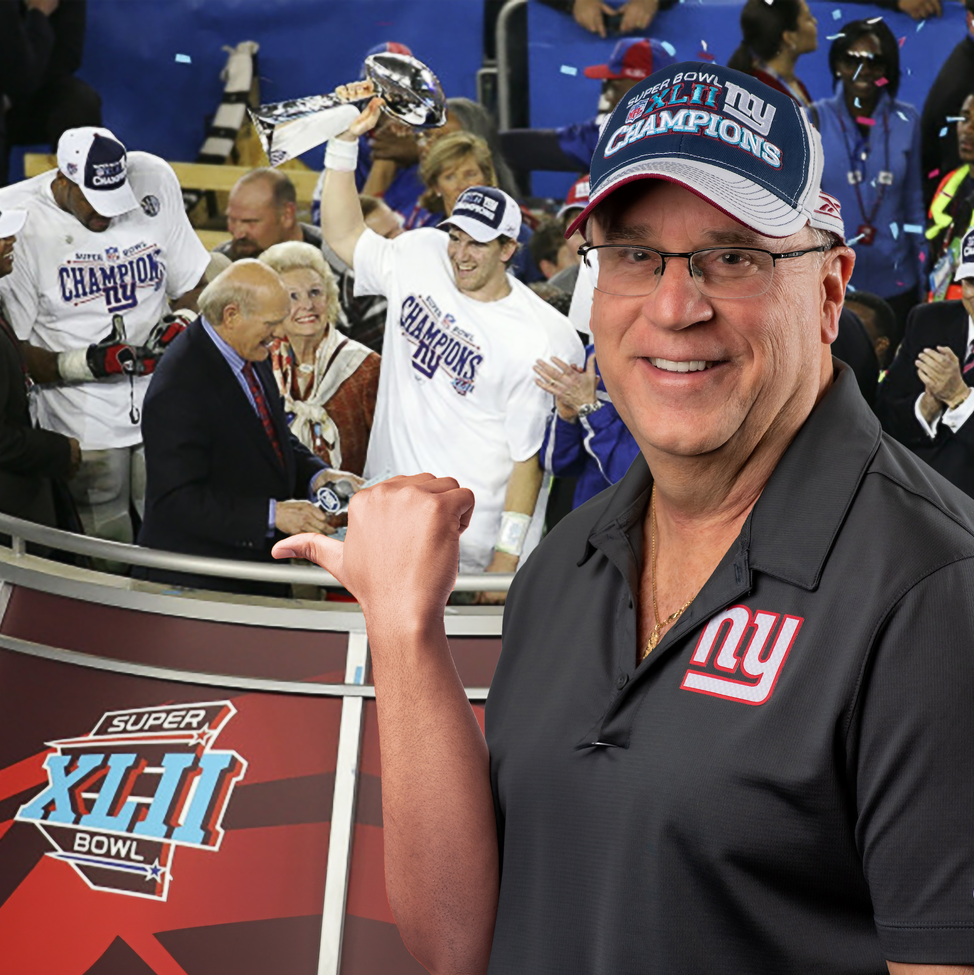 Mike Melando pointing with his thumb to the Giants Super Bowl winners behind him