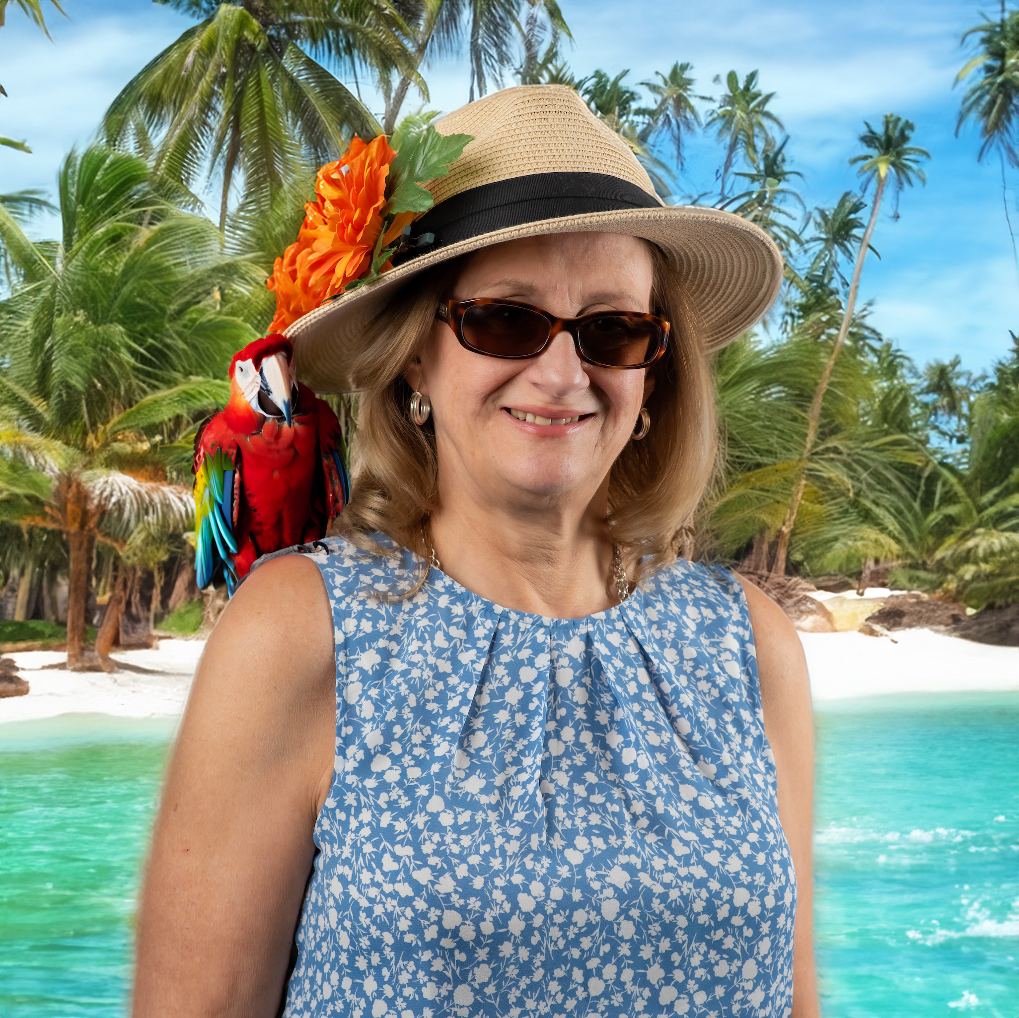 Patricia Rees in front of a tropical beach