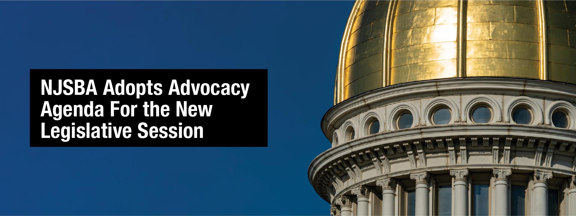 Close up view of the NJ State capital building gold dome with a blue sky in the background