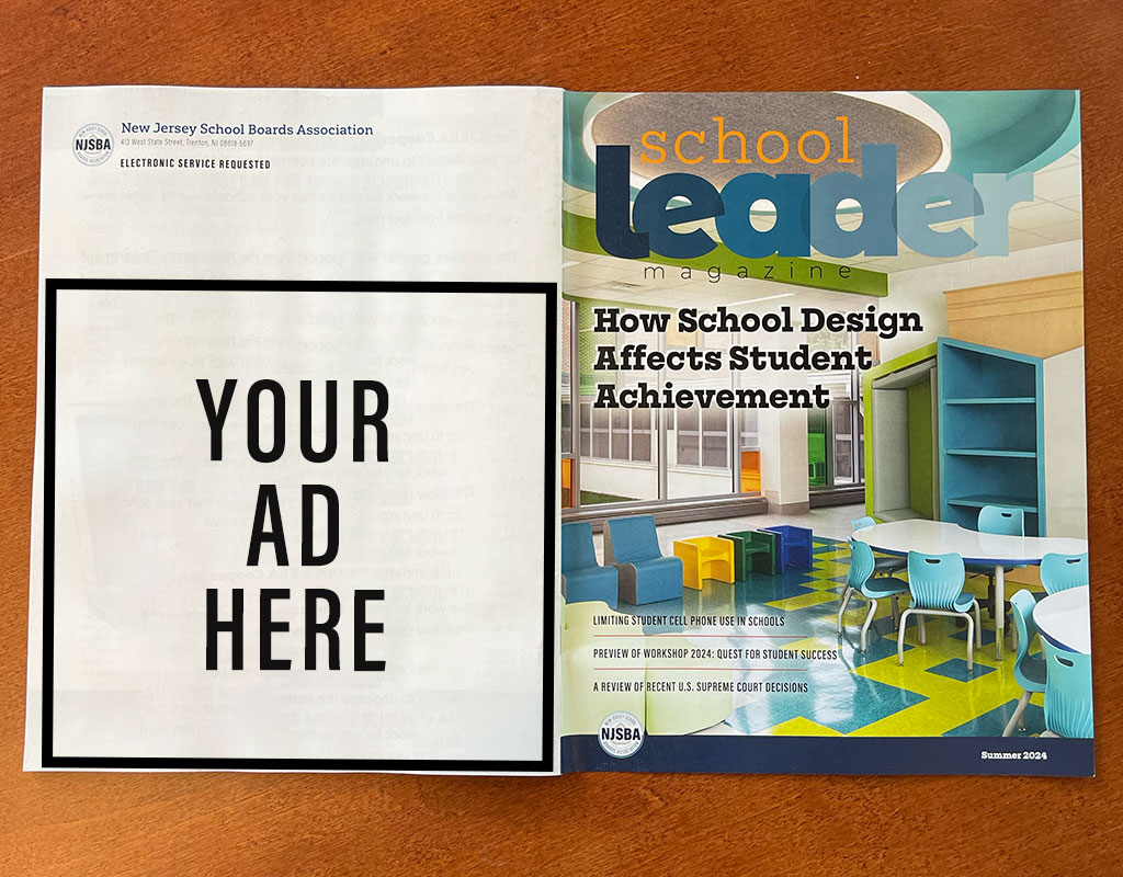 School Leader magazine open displaying the front and back cover, with a square indicating "your ad here"